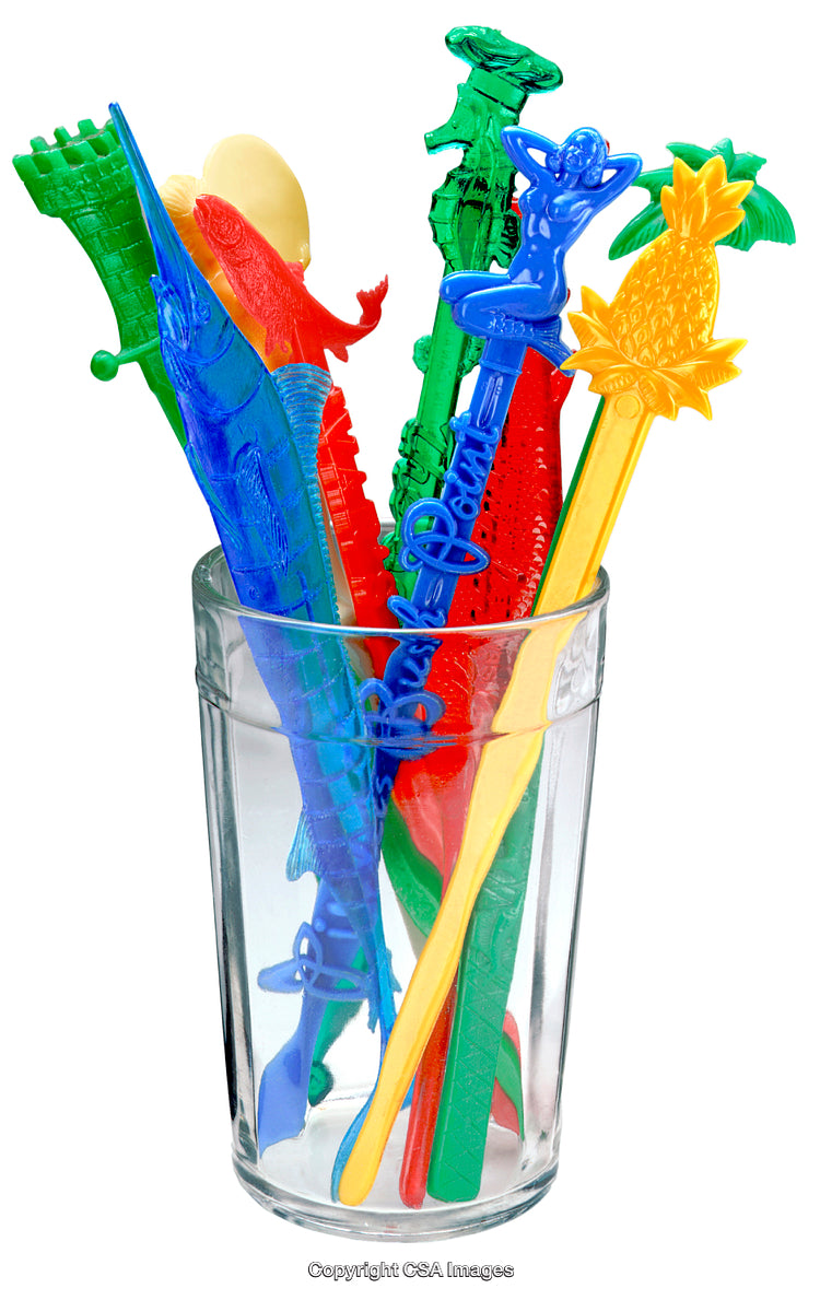 Colorful Plastic Cocktail Stirrers Arranged in a Glass