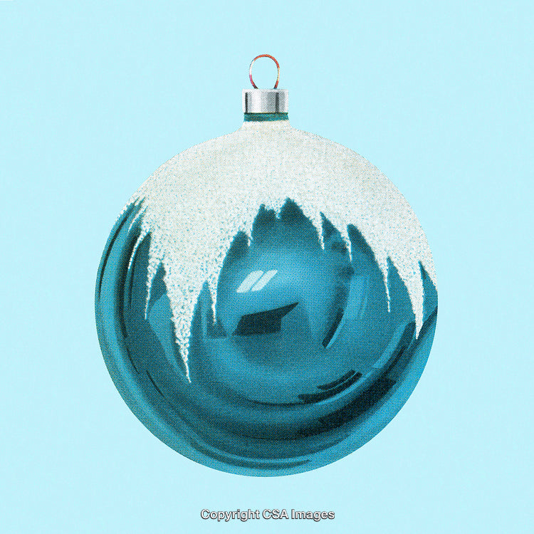 Blue Christmas Ornament with Snowy Design on Blue Background