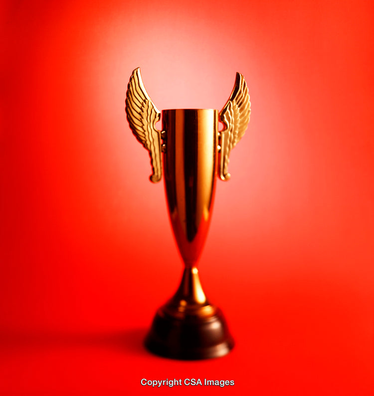 Golden Trophy with Wings on Vibrant Red Background Symbolizing Achievement