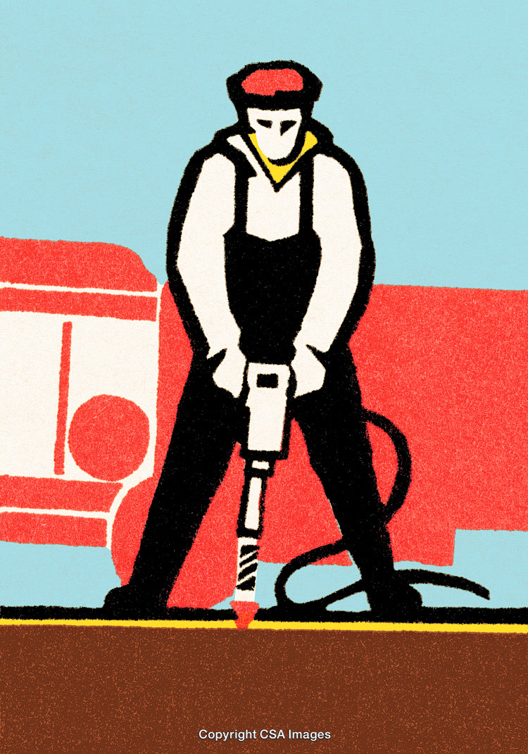 Industrial Worker Using Jackhammer for Construction in Urban Setting