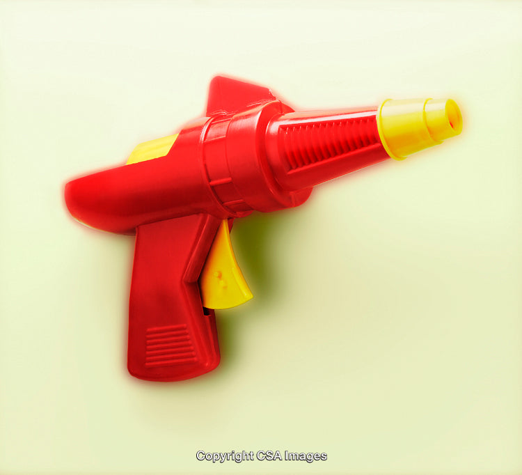 Red and Yellow Toy Blaster Against a Light Background