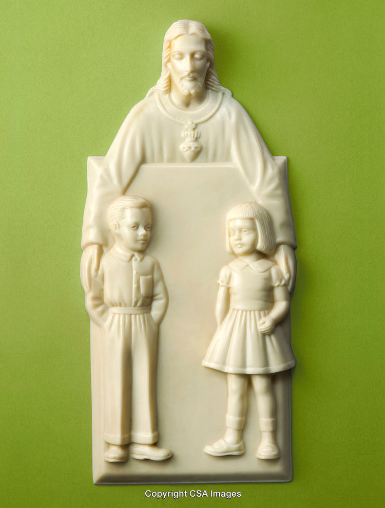 Religious Figurine Depicting Jesus with Children on Green Background