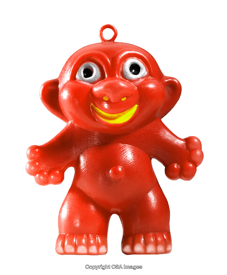 Vibrant Red Plastic Toy Figure With Expressive Smile and Fun Design