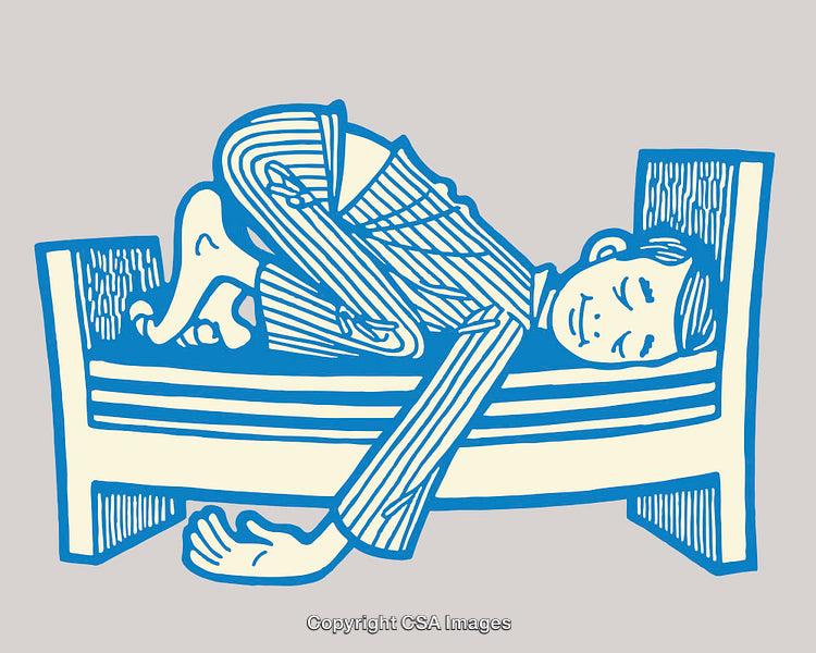 Playful Boy Sleeping in Unique Position on a Bed in Pajamas