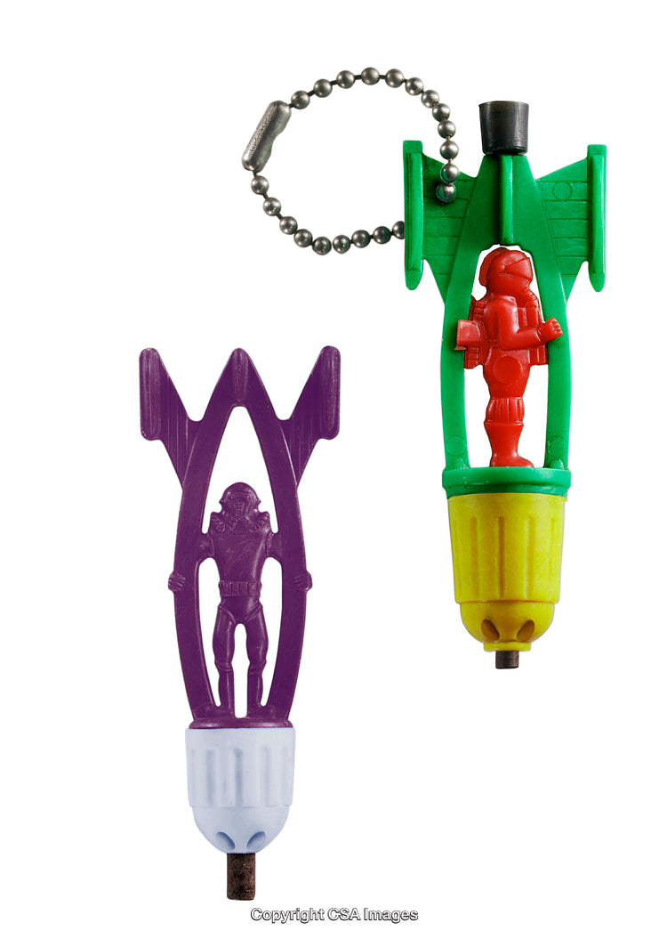 Colorful Plastic Retro Rocket and Astronaut Keychain Toys on White Background