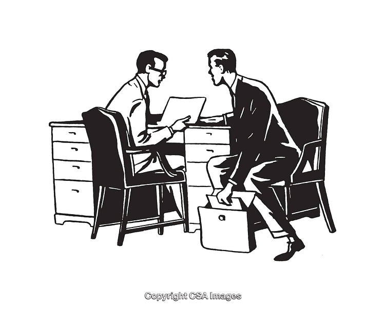 Two Men Discussing Documents During a Business Interaction at an Office Desk