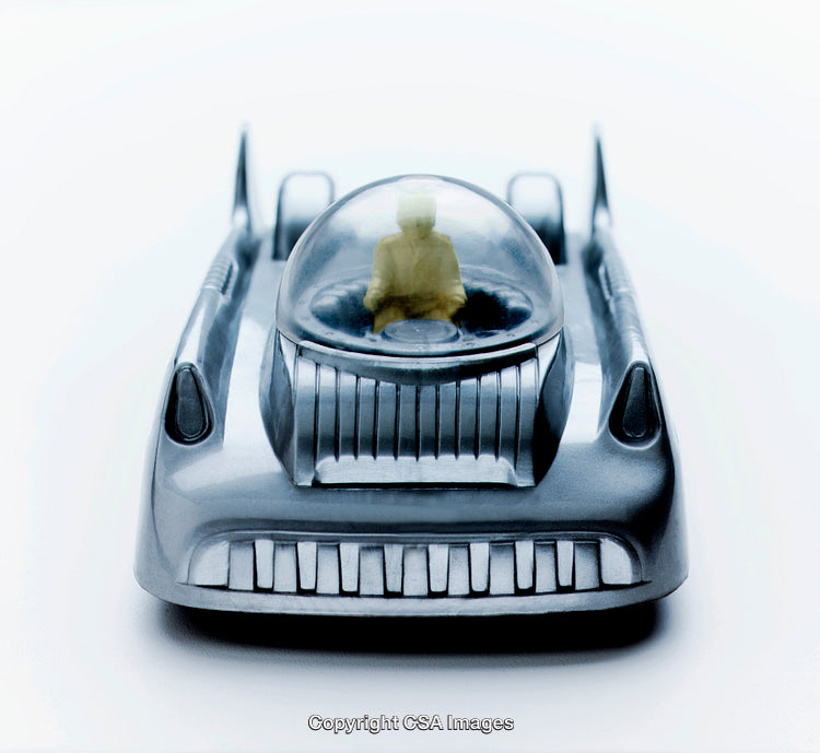 Vintage Toy Car with Futuristic Design and Driver Inside Dome