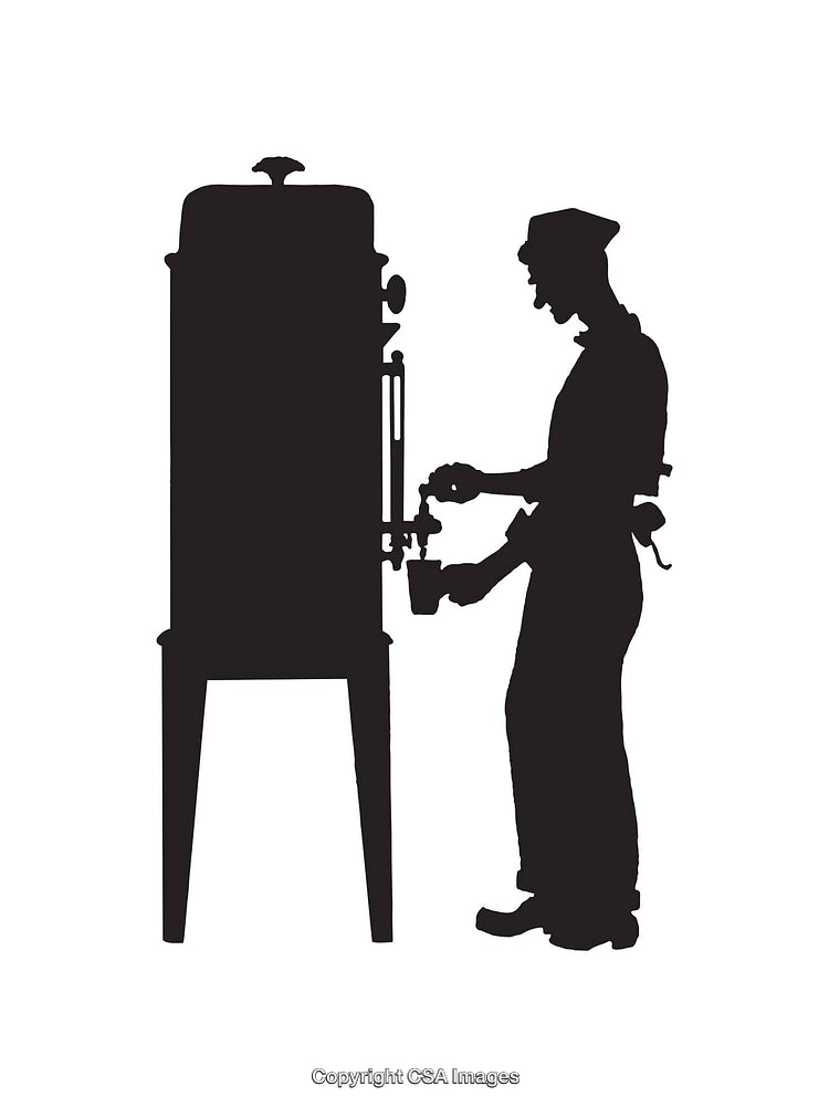 Silhouette of Worker Using Machine for Beverage Preparation