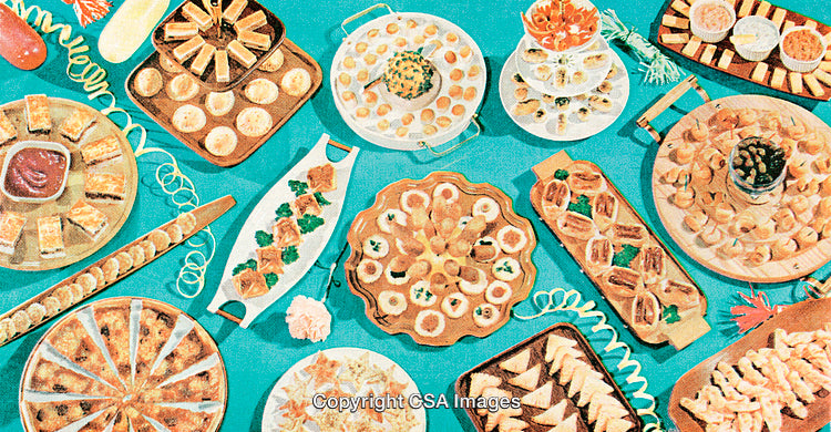 Assorted Appetizers and Finger Foods Arranged on Colorful Tablescape