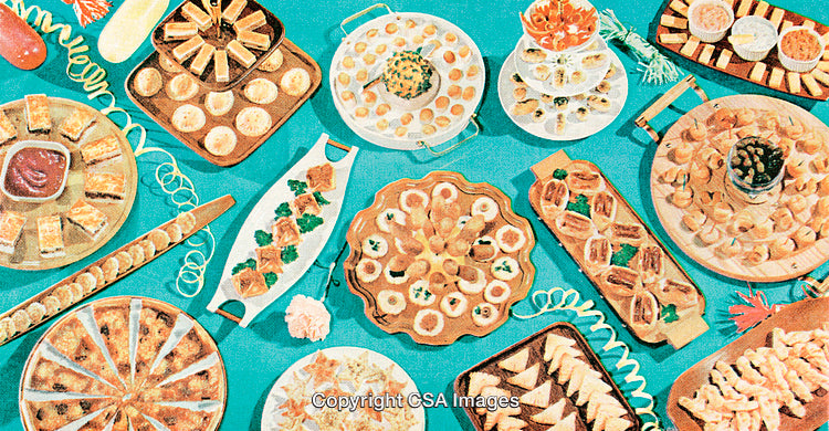 Assorted Appetizers and Finger Foods Arranged on Colorful Tablescape