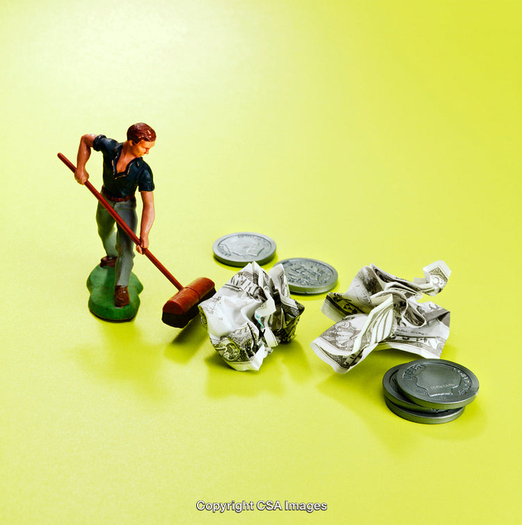 Miniature Worker with Money and Coins on Bright Background