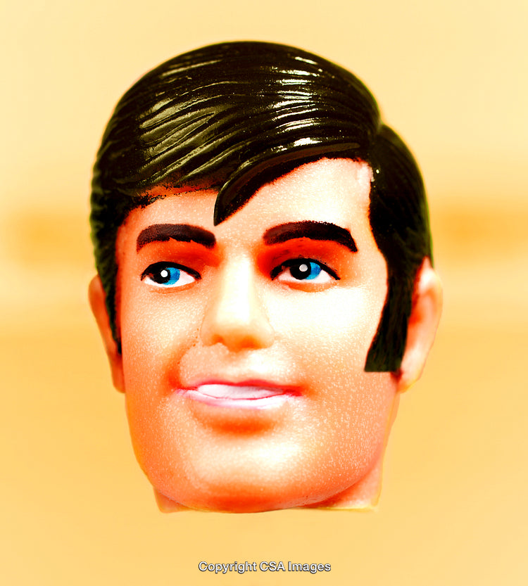 Close-Up of a Plastic Figurine Portrait on Bright Background