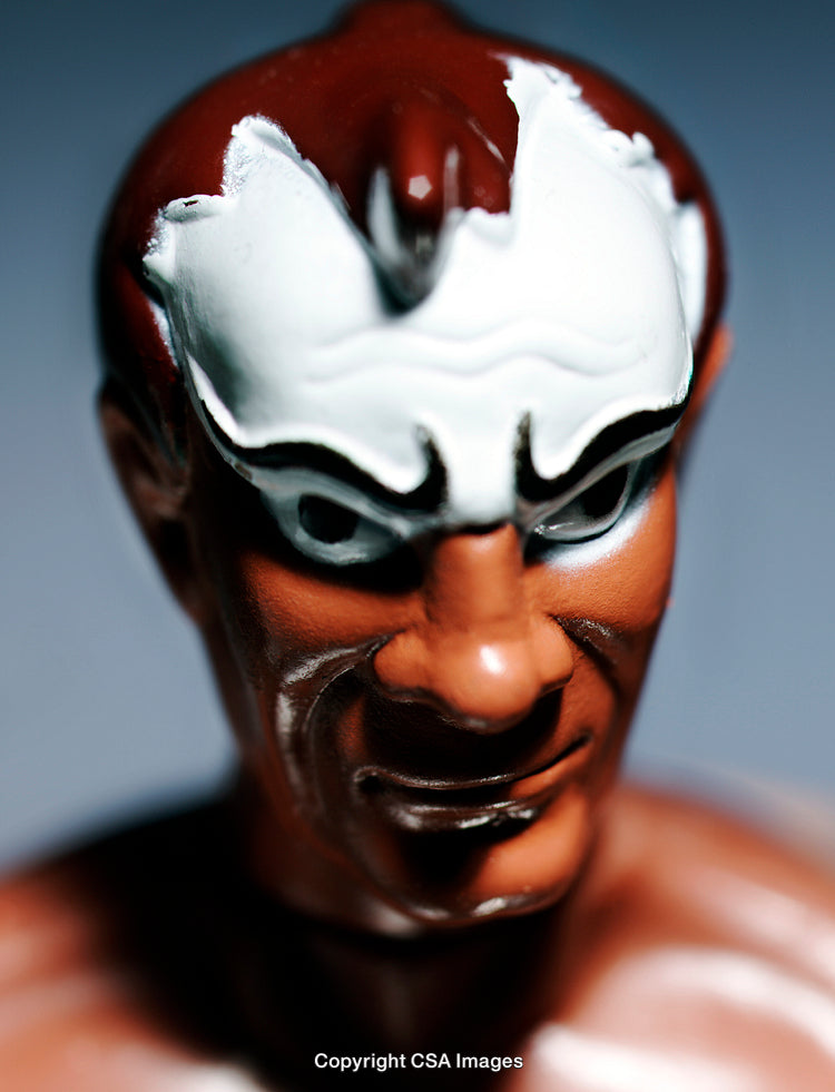 Close-Up of a Painted Plastic Action Figure with Fierce Expression