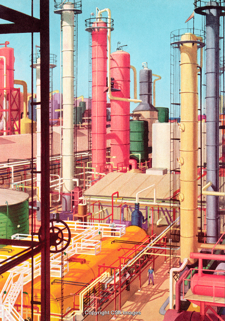 Industrial Facility With Colorful Tanks and Infrastructure Under Clear Sky