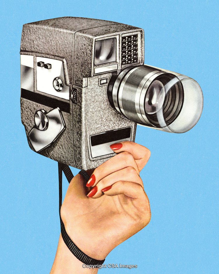 Retro Handheld Camera with Stylish Design and Dramatic Texture on Blue Background