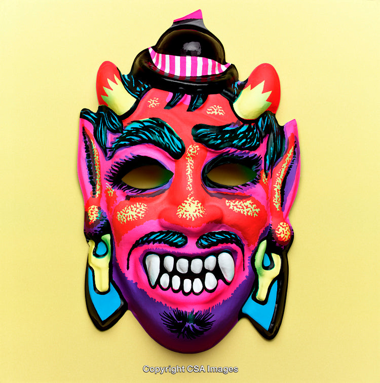 Vibrant Decorative Devil Mask With Bright Colors on Yellow Background
