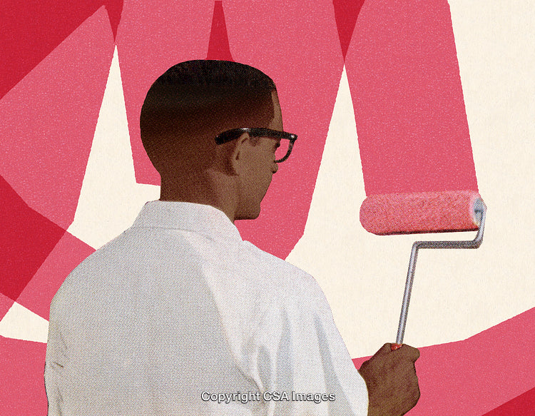 Person Painting Wall with Roller on Vibrant Patterned Background