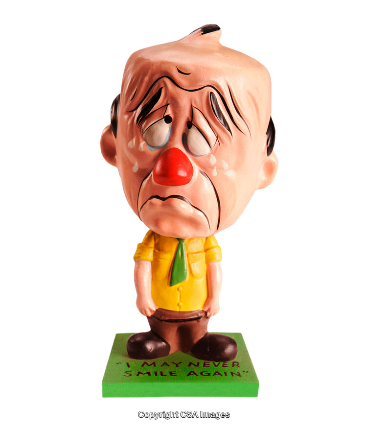 Colorful Cartoon Figurine Expressing Sadness with Classic Vintage Design