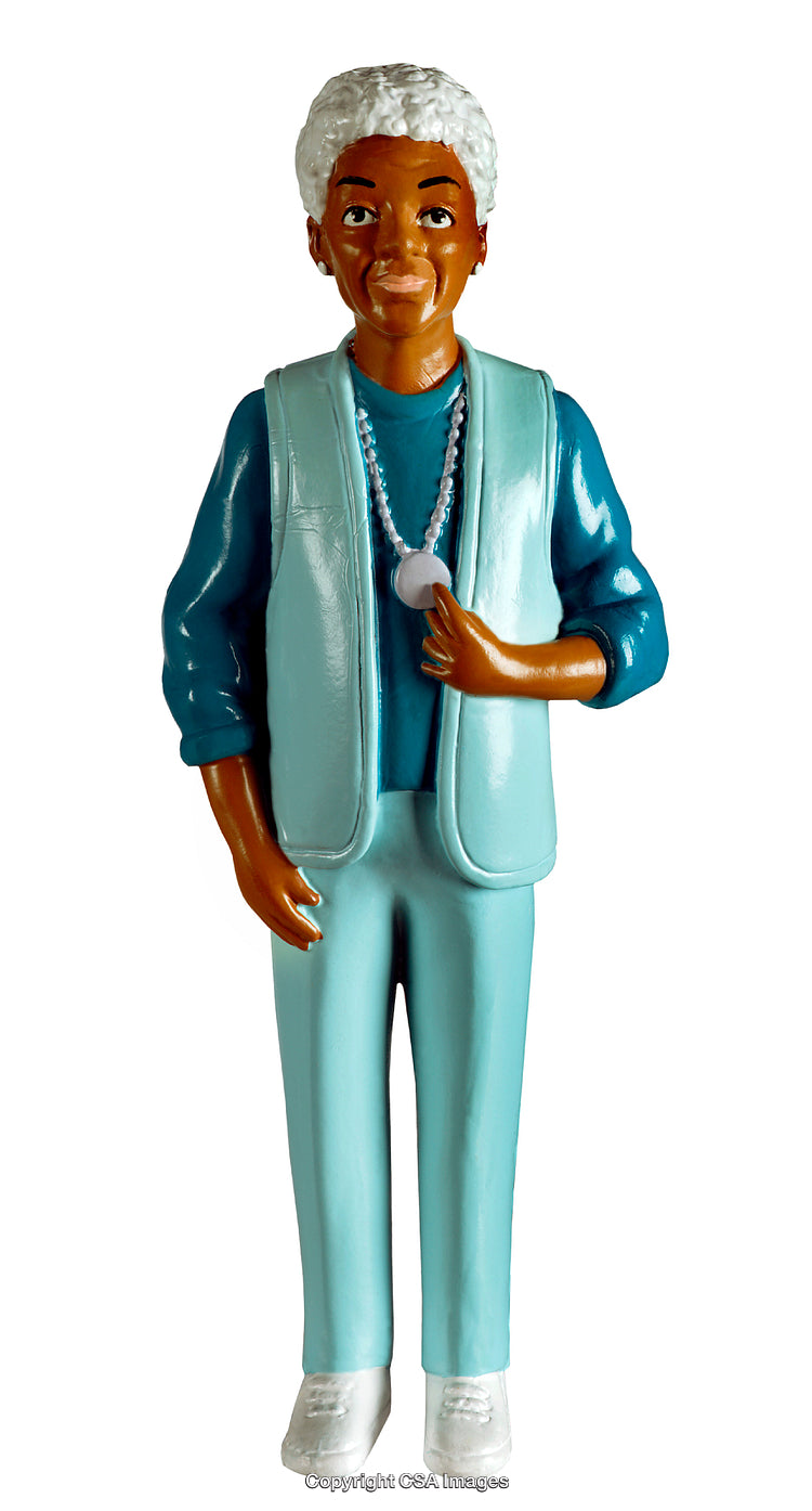 Elderly Male Figure Toy in Blue Outfit Holding a White Accessory