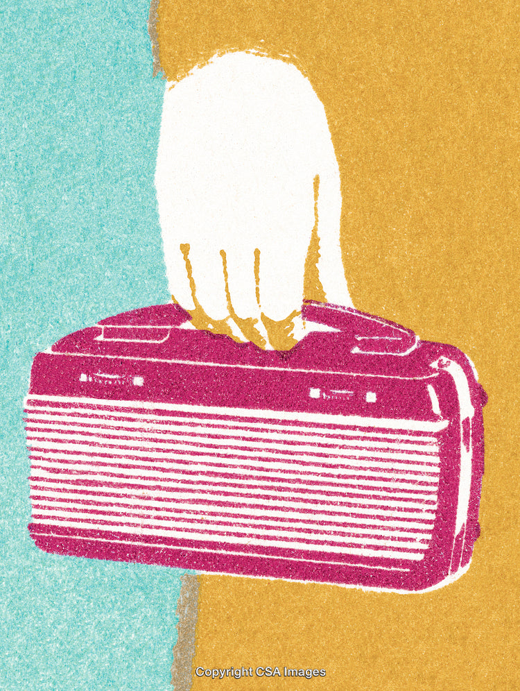 Hand Holding a Retro Portable Radio With Bold and Vibrant Colors