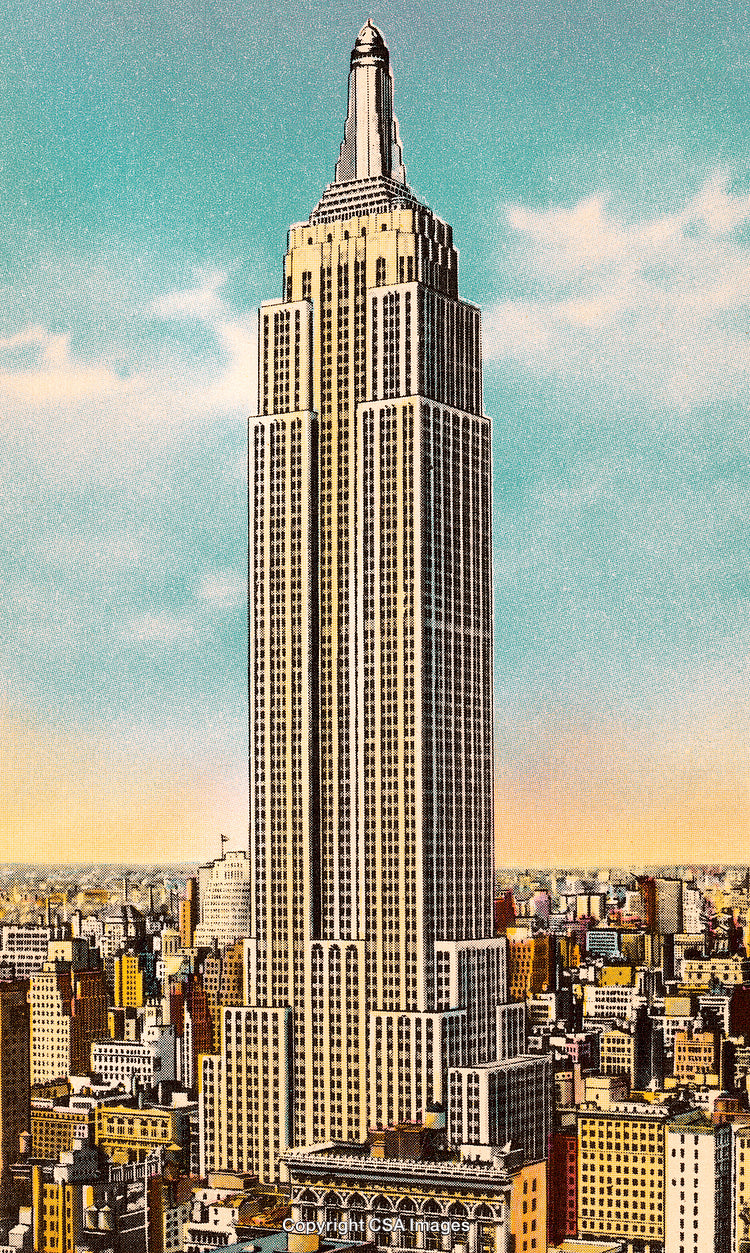 Majestic Skyscraper Towering Over the Bustling City Under a Clear Sky