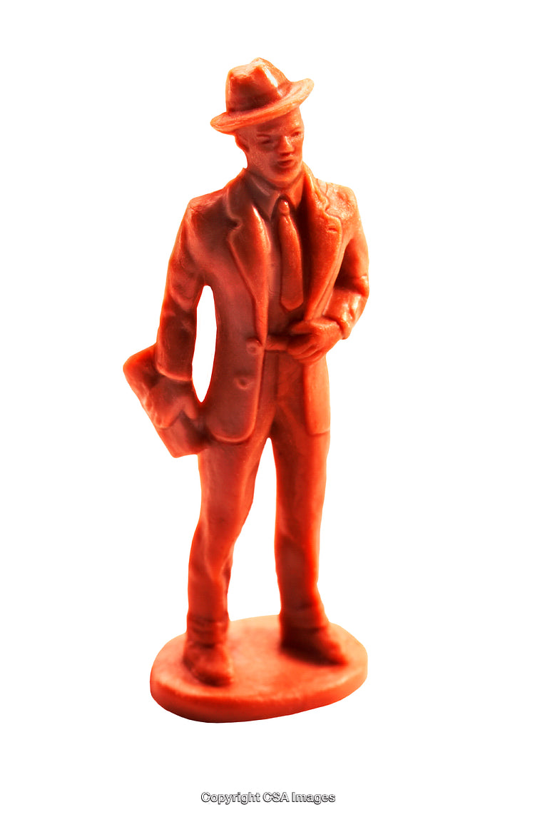 Vintage Plastic Figurine Depicting a Businessman with Hat and Briefcase