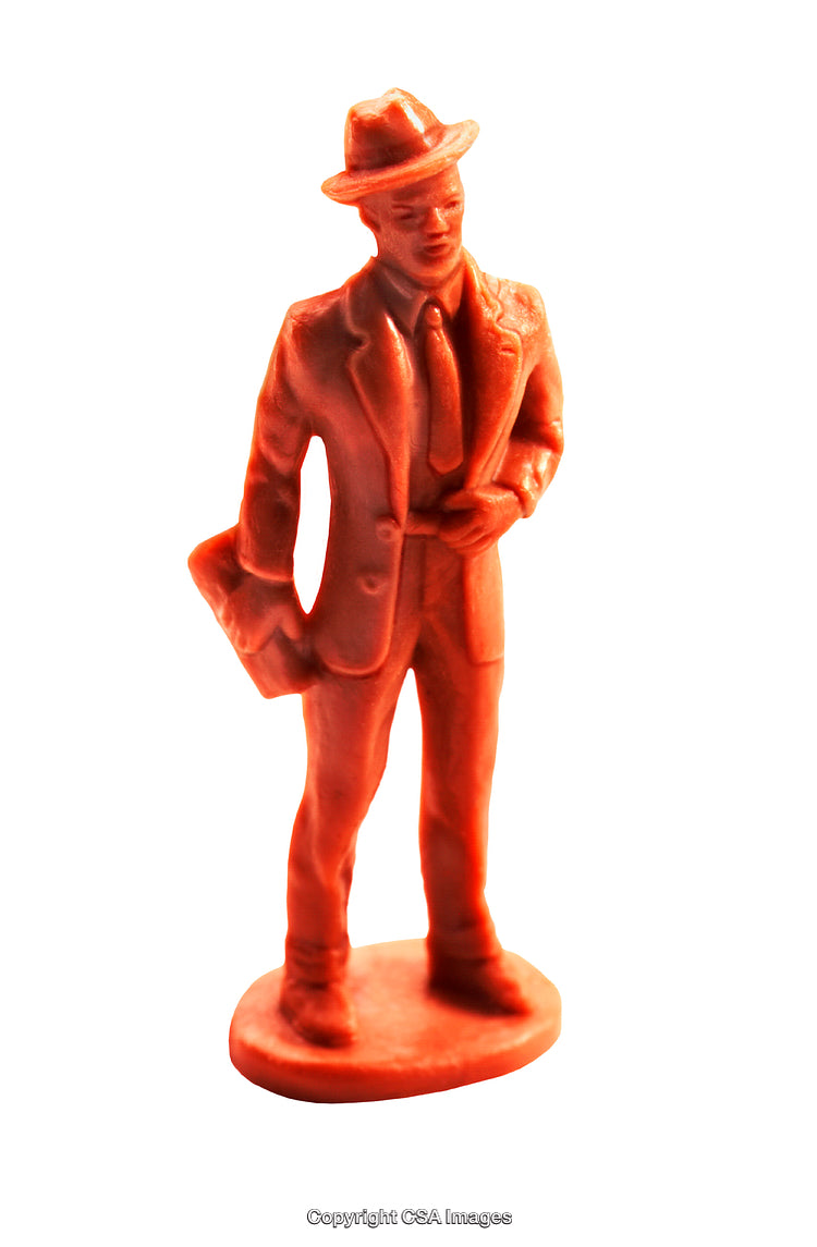 Vintage Plastic Figurine Depicting a Businessman with Hat and Briefcase