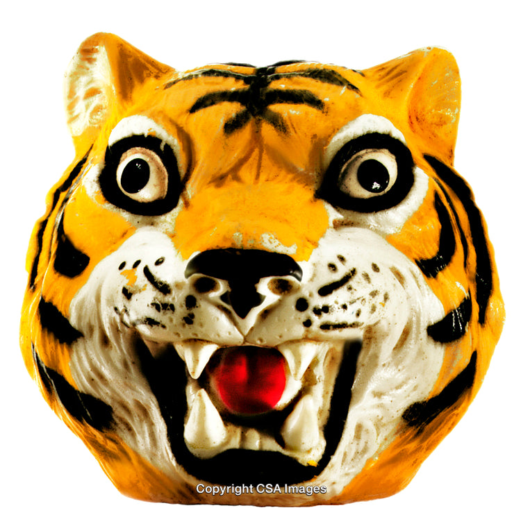 Close-Up of a Vibrant Tiger-Head Plastic Figurine With Fierce Expression