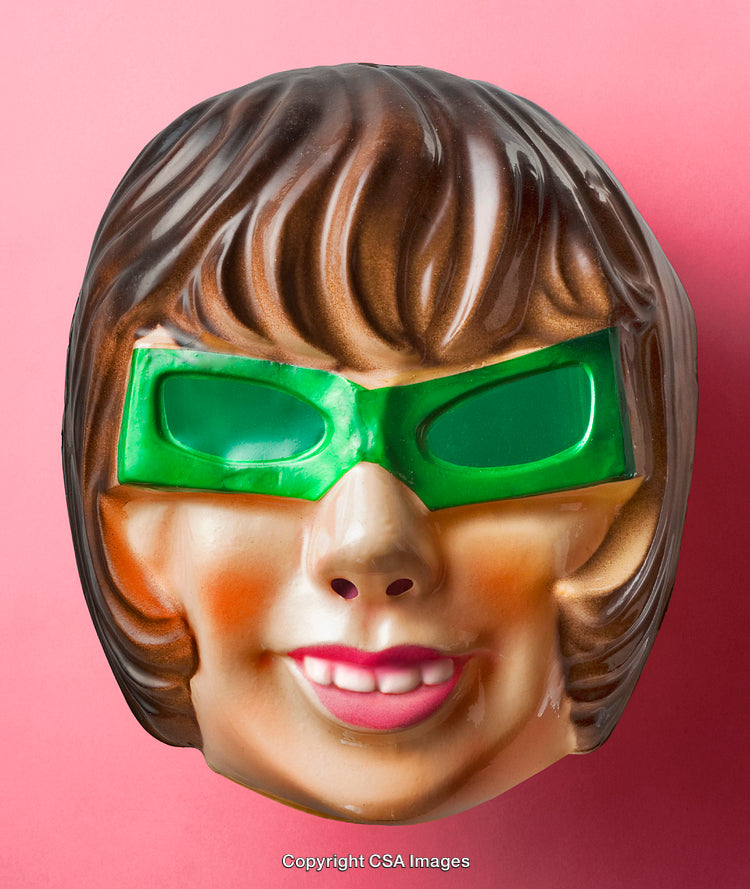 Colorful Retro Mask With Green Lenses on a Pink Background