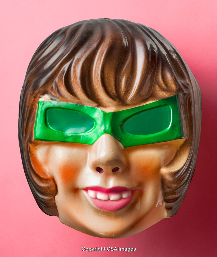 Colorful Retro Mask With Green Lenses on a Pink Background
