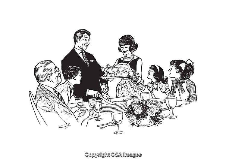 Family Enjoying a Festive Dinner Around the Dining Table