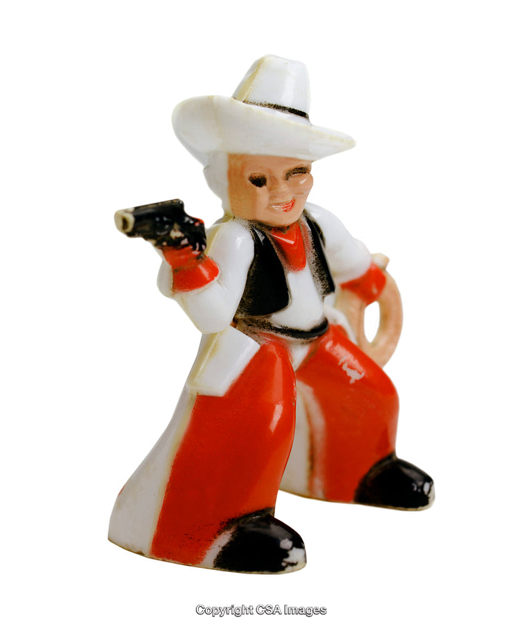 Vintage Ceramic Cowboy Figurine with Red Outfit and Gun