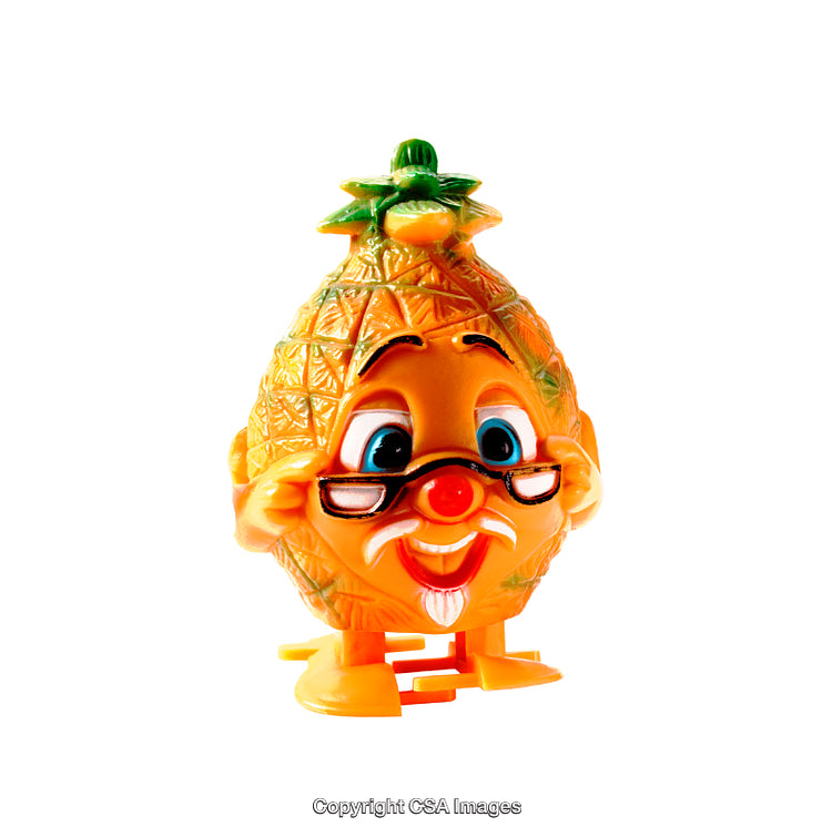 Smiling Pineapple-Shaped Toy Figure with Glasses on White Background