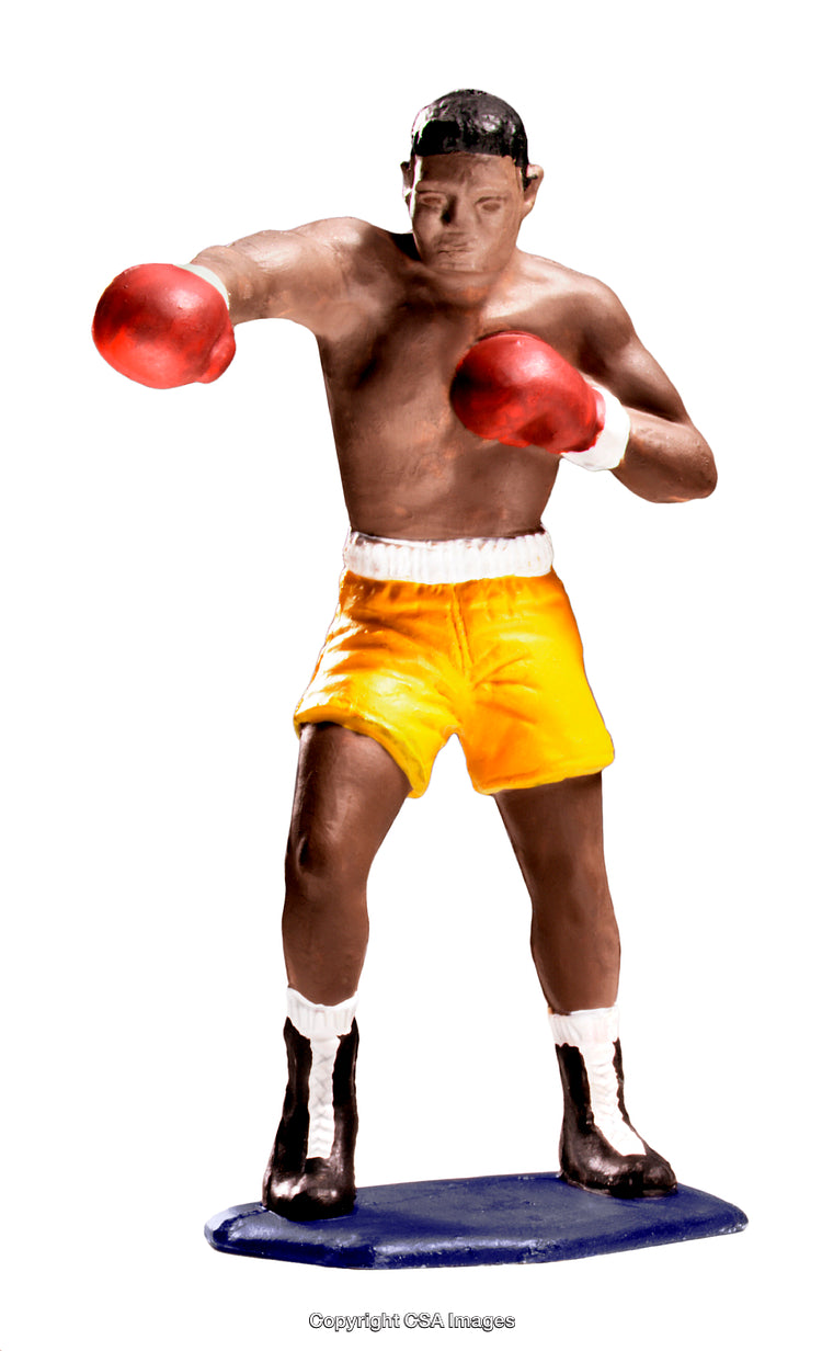 Plastic Toy Boxer Figurine in a Vibrant Boxing Pose on White Background