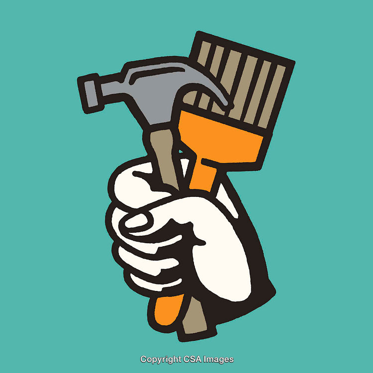Hand Holding Hammer and Paintbrush Representing DIY and Craftsmanship