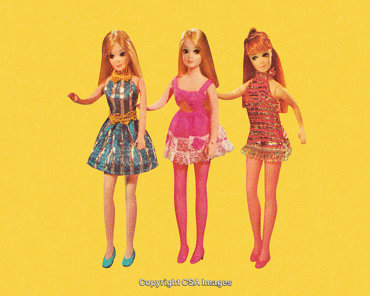 Vintage Style Photograph of Dolls in Colorful Dresses on Yellow Background