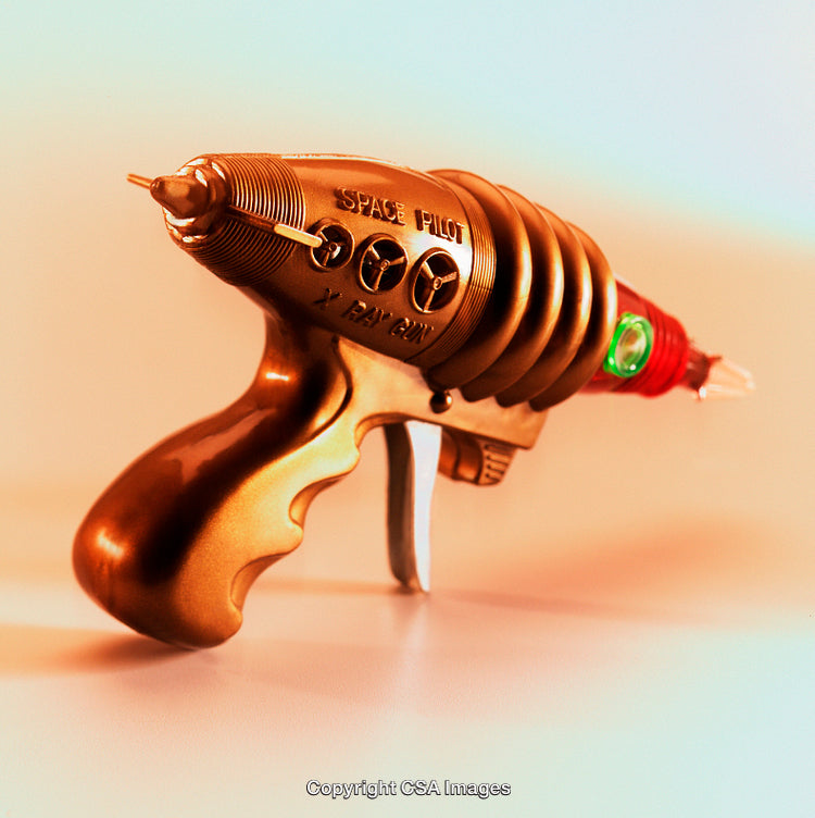 Vintage Retro Styled Toy Ray Gun with Golden Finish and Spiral Design