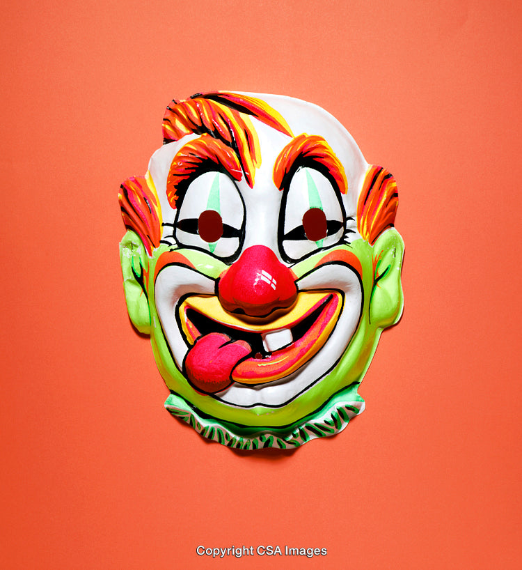 Colorful Clown Mask on Vibrant Orange Background