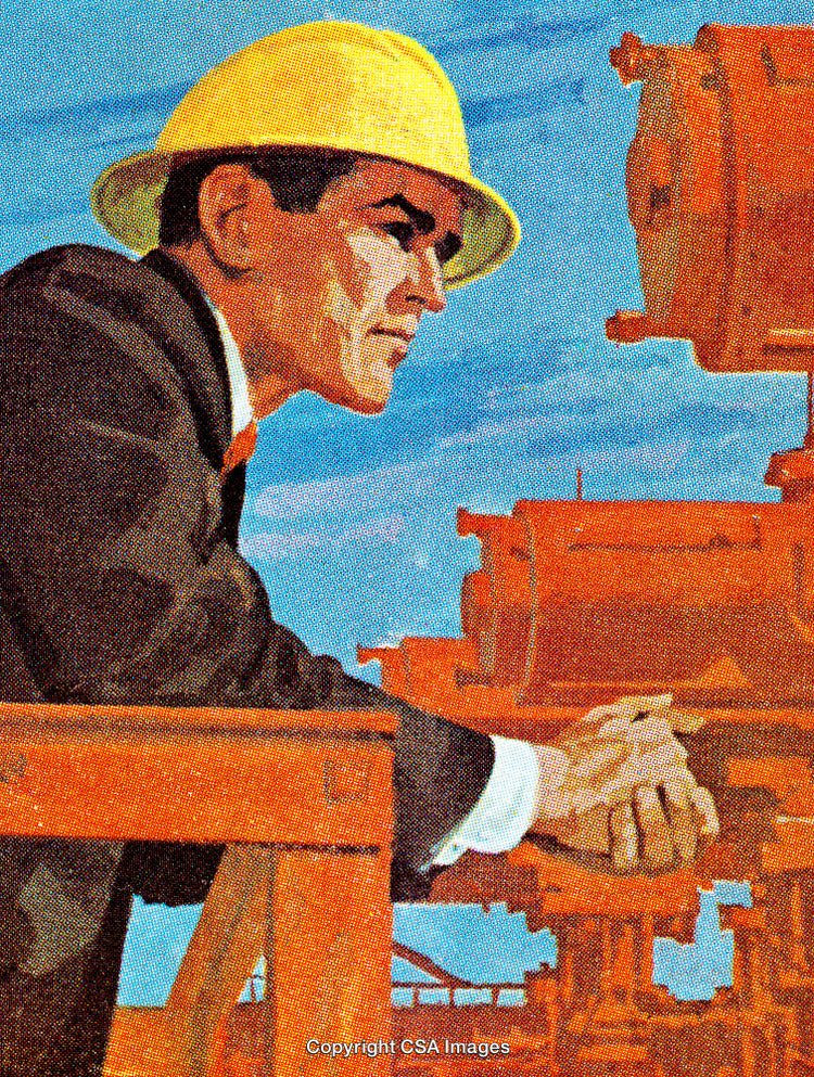 Professional Engineer Observing Industrial Equipment Against a Clear Blue Sky