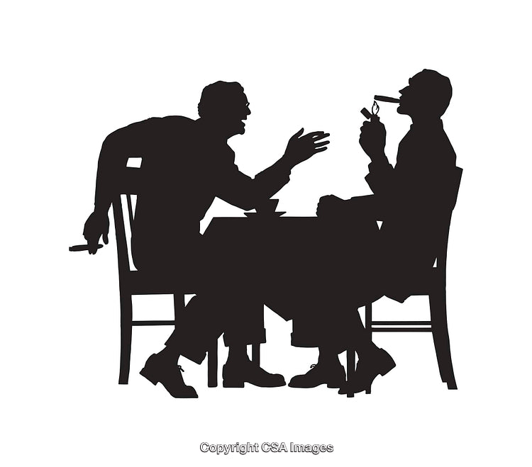 Silhouette Discussion Between Two Men in a Relaxed Setting
