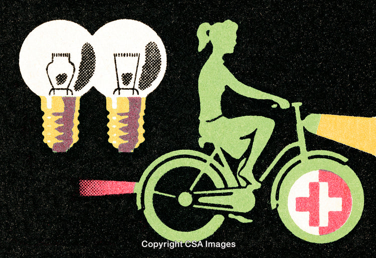 Creative Energy Concept Depicting a Bicyclist Powering a Light Bulb