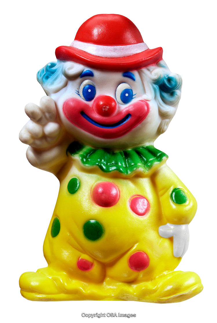 Colorful Clown Figurine with Red Hat and Polka Dot Outfit on White Background