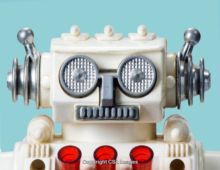 Close-Up of a Retro Toy Robot with a Blue Background