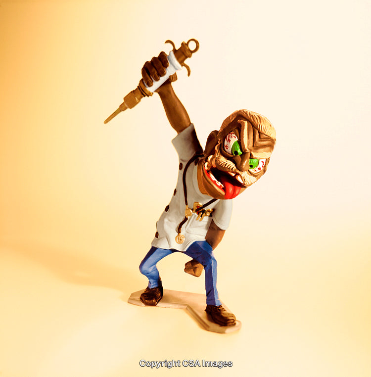 Quirky Toy Doctor Holding Syringe Figurine on Solid Background