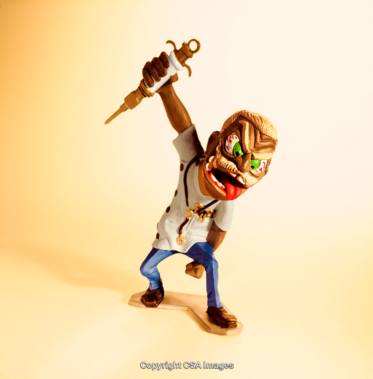 Quirky Toy Doctor Holding Syringe Figurine on Solid Background