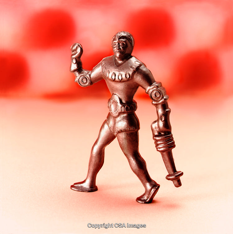 Retro Metallic Action Figure Toy Set Against a Vibrant Red Background