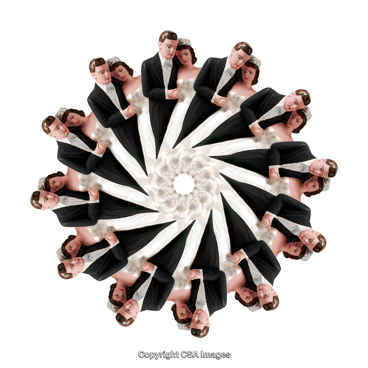 Spiral Composition Featuring Bride and Groom Figurines on White Background