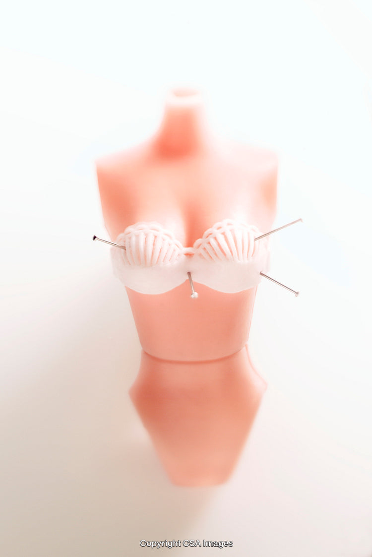 Artistic Composition of a Stylized Plastic Figure Highlighting Knitting Concept