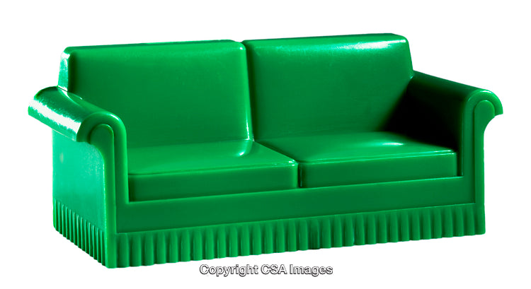Green Toy Couch Representing a Miniature Furniture Piece