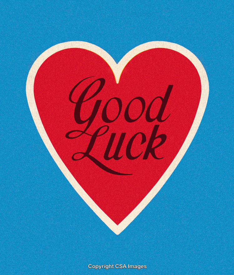 Heart-Shaped Design Featuring Good Luck Text on a Blue Background